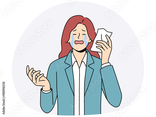 Upset woman crying wiping tears with paper napkin after business went bankrupt due to financial crisis. Sad businesswoman crying and needing support to solve psychological problems