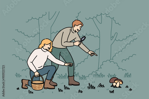 Man and woman are searching for mushrooms in forest using wicker basket and magnifying glass. Guy and girl collect mushrooms in national natural park, after harvest season or rainy weather