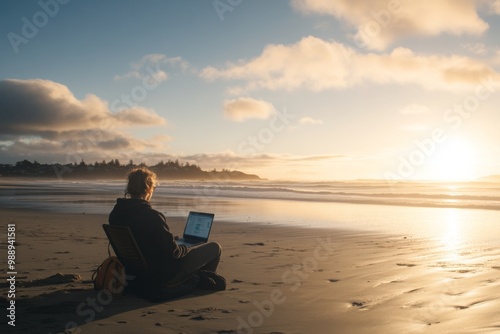 Person Working on a Beach at Sunset