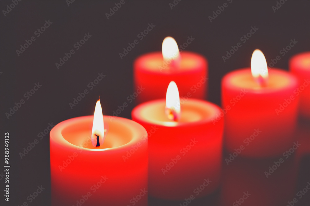 Candle in red and gray on a . ation colorful gift concept. a small candle burning in a dark gray . small candles burning in a dark of gray lifestyle and red. Candle in red and gray on a . ation colorful gift concept. a small candle burning in a dark gray . small candles burning in a dark of gray lifestyle and red.