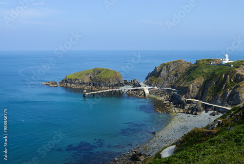 Elevated view of the landing bay of the Lundy Island and  Lundy South Lighthouse in the Bristol Channel in tranquil day