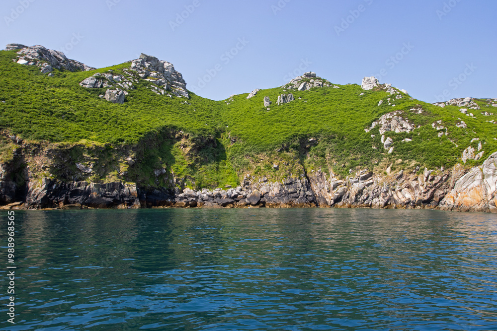 Shoreline of 'Lundy Island' in the Bristol Channel on tranquil day