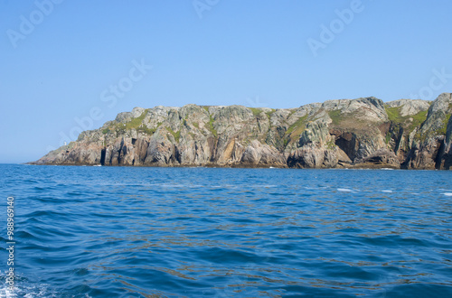 Obraz na płótnie Shoreline of 'Lundy Island' in the Bristol Channel on tranquil day w salonie