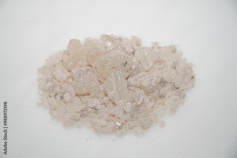 Aromatic heap of Damar Mata Kucing (Shorea Javanica) resin gum, also known as Dammar gum, isolated on a clean white background. Aromatic heap of Damar Mata Kucing (Shorea Javanica) resin gum, also known as Dammar gum, isolated on a clean white background.
