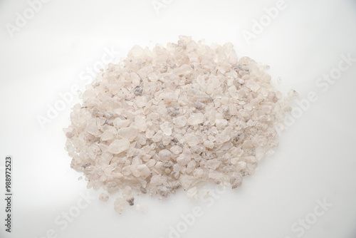 Aromatic heap of Damar Mata Kucing (Shorea Javanica) resin gum, also known as Dammar gum, isolated on a clean white background.