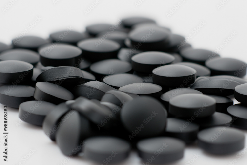 The tablets are and on a white . Medicine pharmacy health concept. Small tablets close-up. lifestyle Small pills about. The tablets are and on a white . Medicine pharmacy health concept. Small tablets close-up. lifestyle Small pills about.
