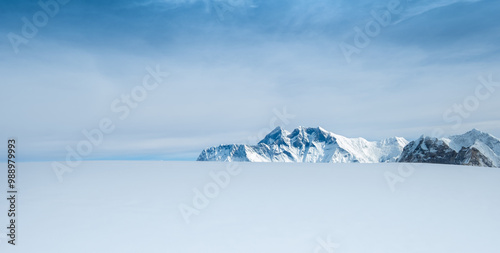 Mount Everest, Nuptse, Lhotse with South Face wall beautiful panoramic shot of a High Himalayas from Mera peak slope snow fields at cca 6000m. Beauty in Nature and extreme sports concept image.