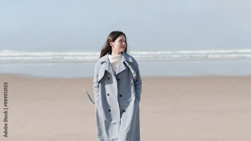 An active woman in training gear is boxing outdoors on a sunlit beach, demonstrating a healthy lifestyle. An active woman in training gear is boxing outdoors on a sunlit beach, demonstrating a healthy lifestyle.