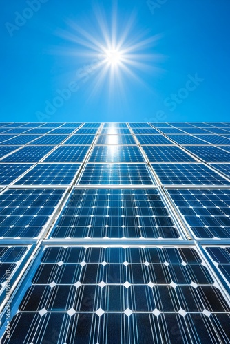 Solar panels reflecting sunlight in a clear blue sky, showcasing renewable energy and sustainability. photo