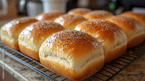 Freshly Baked Sesame Seeded Bread Rolls on Cooling Rack