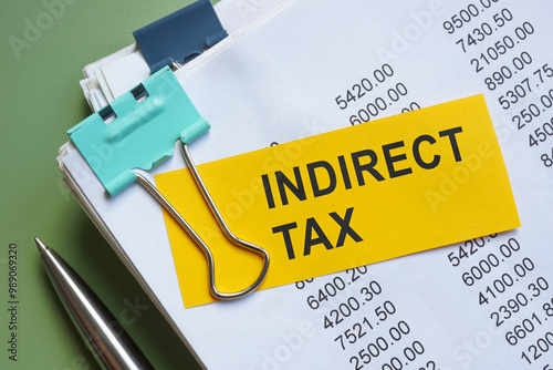 Stack of papers with a note about indirect tax.