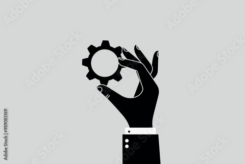 Hand holding a gear, concept of creativity and business.