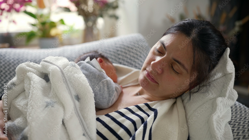 Mother sleeps soundly on a comfortable couch while cradling her newborn baby, wrapped in a soft blanket, surrounded by warm, natural light in a peaceful living room Mother sleeps soundly on a comfortable couch while cradling her newborn baby, wrapped in a soft blanket, surrounded by warm, natural light in a peaceful living room