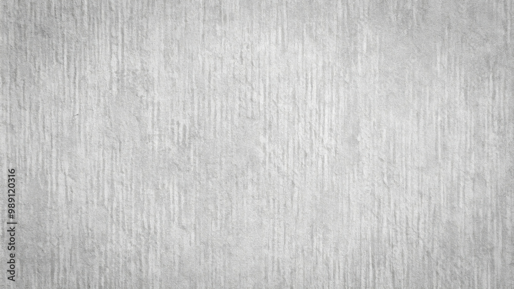 Fototapeta premium A simple gray texture background featuring subtle variations and smooth finish, perfect for various design applications. This versatile backdrop adds modern touch to any project