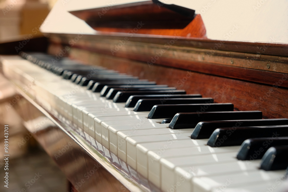 Piano white-black keys close up abstract blurred background. view of piano keys detail and depth of classic grand piano keyboard. Music, melody, Piano playing concept. selective focus Piano white-black keys close up abstract blurred background. view of piano keys detail and depth of classic grand piano keyboard. Music, melody, Piano playing concept. selective focus