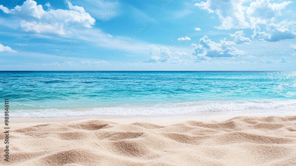 Fototapeta premium Serene Tropical Beach with Soft Sand and Turquoise Ocean Waves Under Cloudy Sky