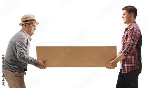 Bild auf Leinwand Young and older man carrying a cardboard box