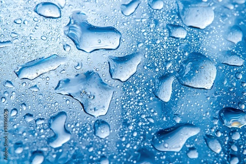 Wallpaper Mural Water Droplets on a Smooth Blue Surface Torontodigital.ca