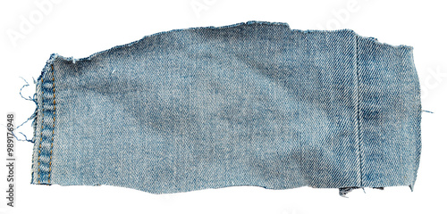 Piece of torn denim on a white background. Denim texture