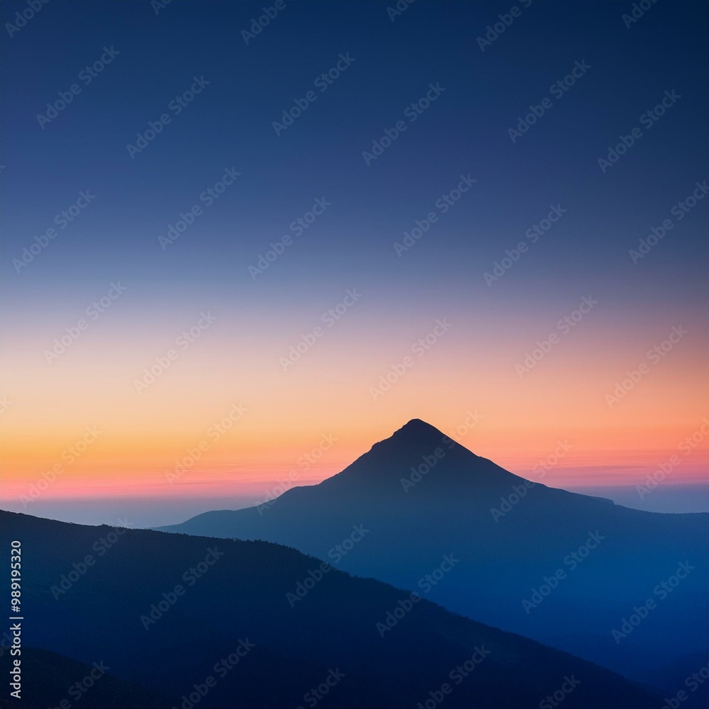 minimalist landscape. Solitary mountain peak silhouetted against gradient sky minimalist landscape. Solitary mountain peak silhouetted against gradient sky