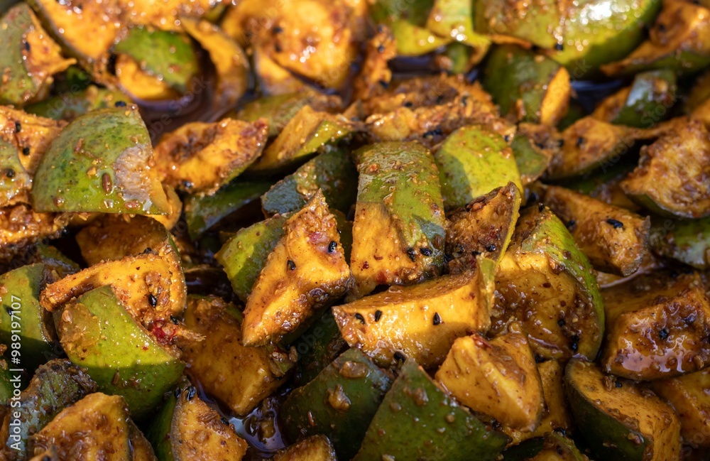 Closeup of Indian Authentic Mango Pickle with Spices like Chili Powder, Fennel Seed, Black Cumin and Oil Closeup of Indian Authentic Mango Pickle with Spices like Chili Powder, Fennel Seed, Black Cumin and Oil