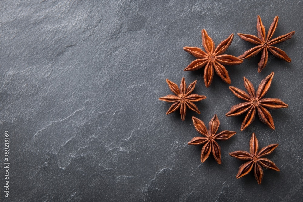 Aromatic star anise on dark slate background Aromatic star anise on dark slate background