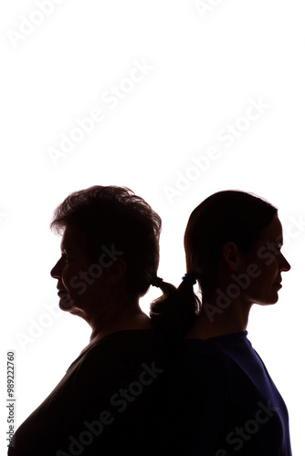 Silhouette elderly woman opposite young woman, mother and daughter - isolate