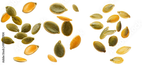 Falling Pumpkin seed, isolated on white background, clipping path, full depth of field photo