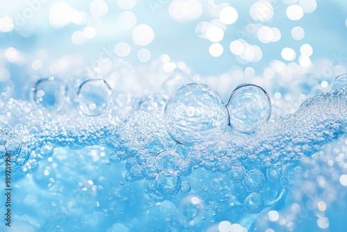 Sparkling water bubbles on blue background