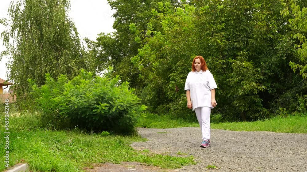 Senior woman walks relaxing outdoor on nature Senior woman walks relaxing outdoor on nature