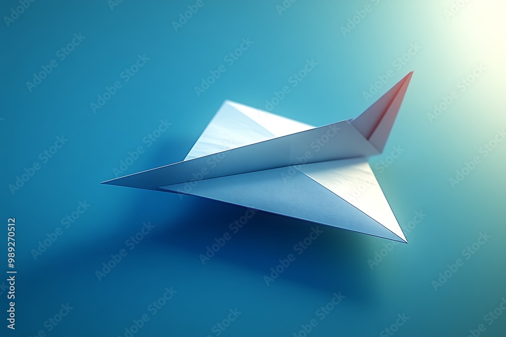 A white paper plane soaring against a blue background. A white paper plane soaring against a blue background.