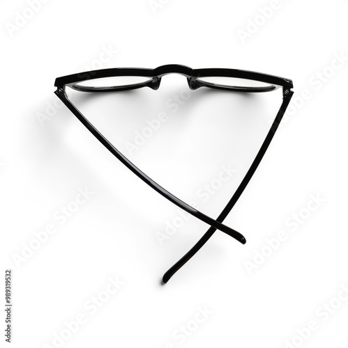 Top View of Black Round Glasses with Crossed Arms photo