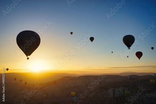 Hot Air Balloons at Sunrise Over Cappadocia landscape photo