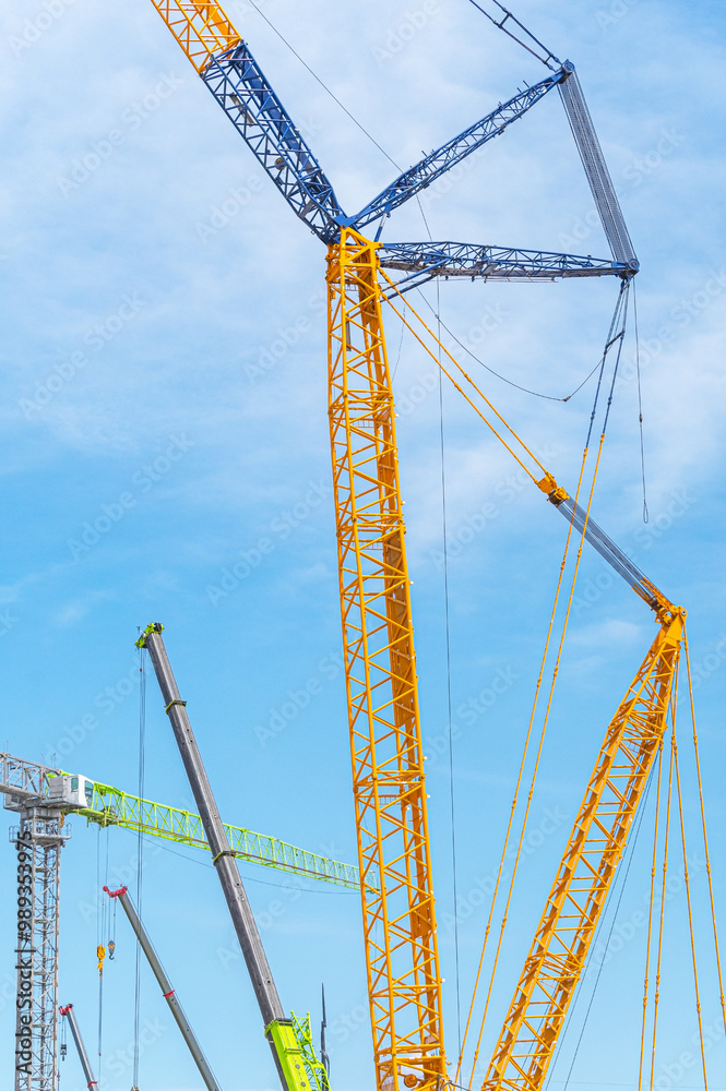 construction crane at blue sky as background