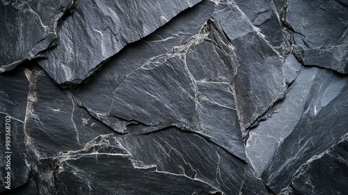 Wallpaper Mural Close-up of textured black slate stone surface, showcasing natural patterns and unique layers for an elegant design element. Torontodigital.ca