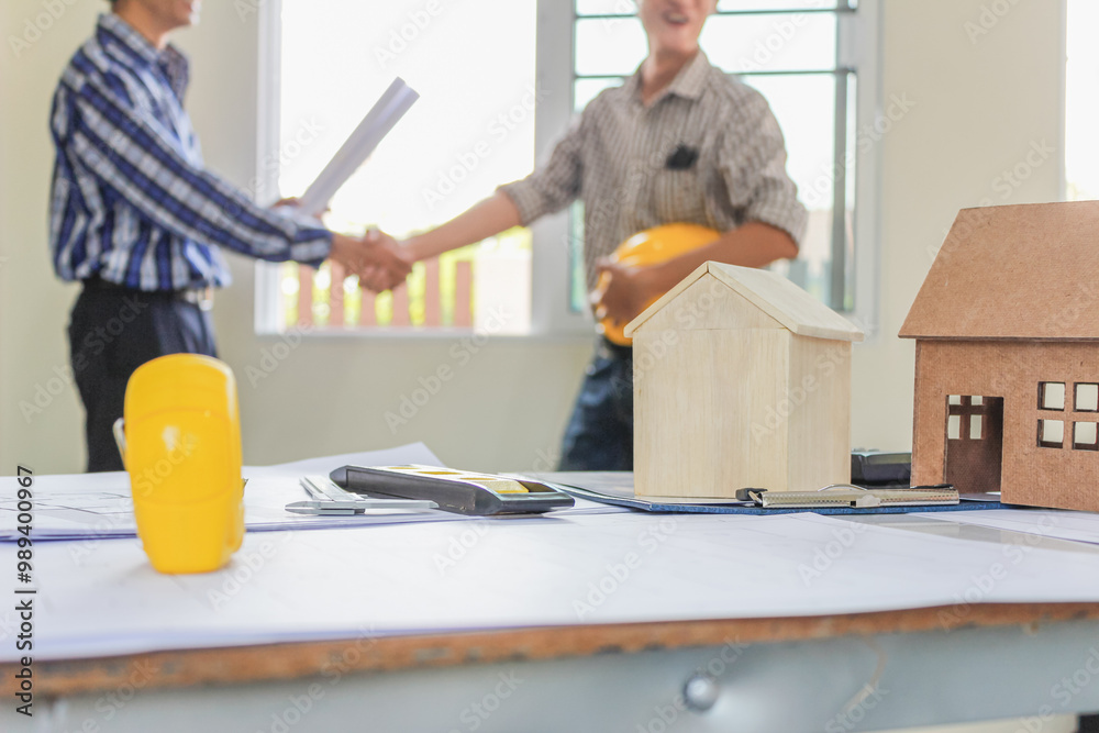 Φωτογραφία Plans and documents are placed on desks in the engineering team's office to prepare for the meeting of the designers, engineers and foreman teams to supervise the construction work as planned