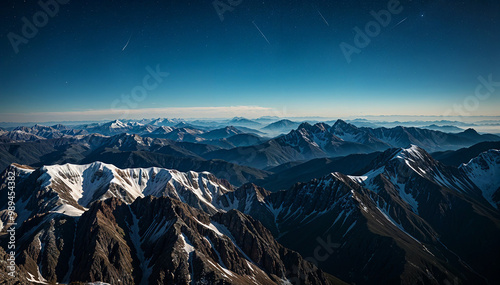 Snow-Capped Peaks Under a Starry Night Sky