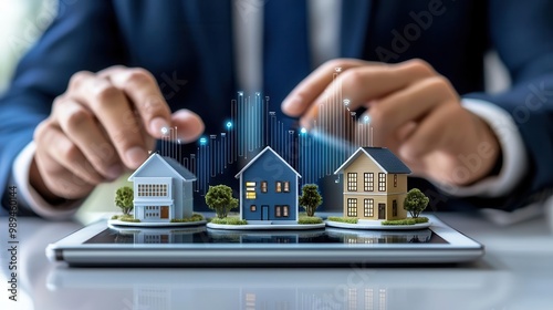 Businessman analyzing real estate investment demand on digital tablet with charts, property market trends, growing demand, financial growth strategy