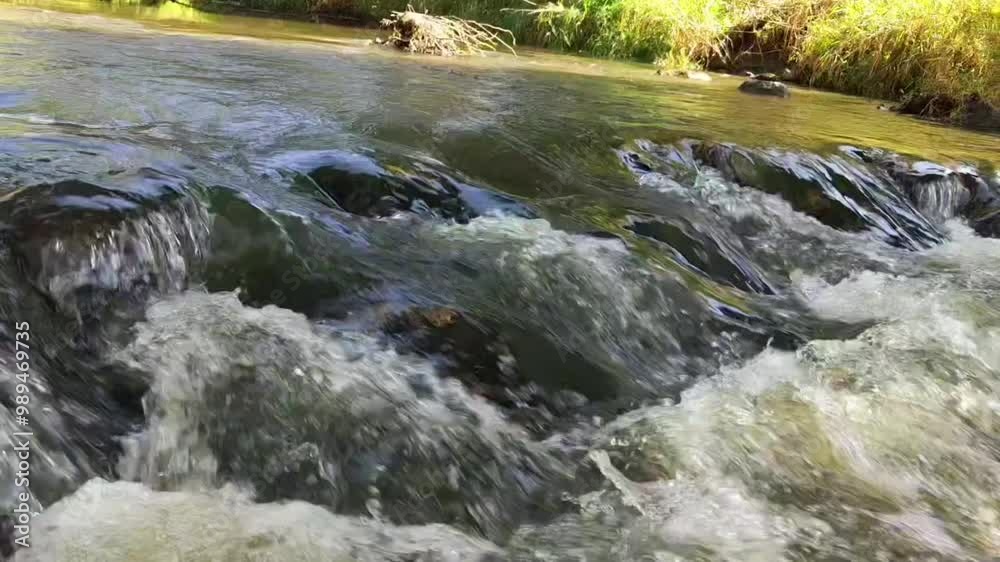 water flowing over the whitewater river rocks water flowing over the whitewater river rocks