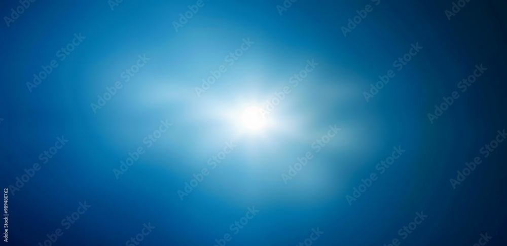 Abstract Blue Gradient Background with White Glow Light