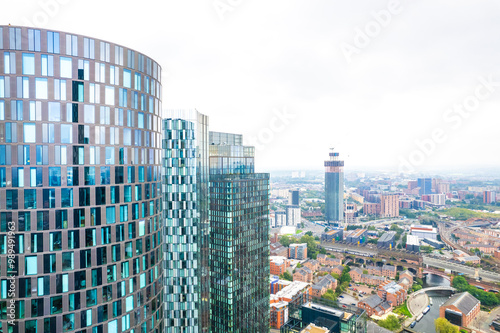 Canvas Print Commercial area, highrise tower office building in Deansgate Manchester, overcas