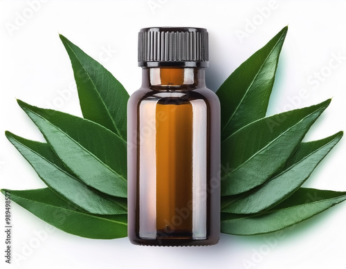 Herbal medicine bottle with some fresh leaves beside it isolated on minimalist background