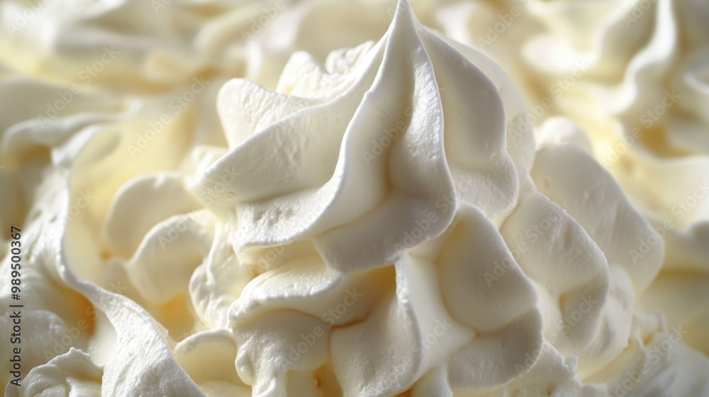 The enchanting beauty of whipped cream s soft swirls creates a sensation of luxurious indulgence The enchanting beauty of whipped cream s soft swirls creates a sensation of luxurious indulgence