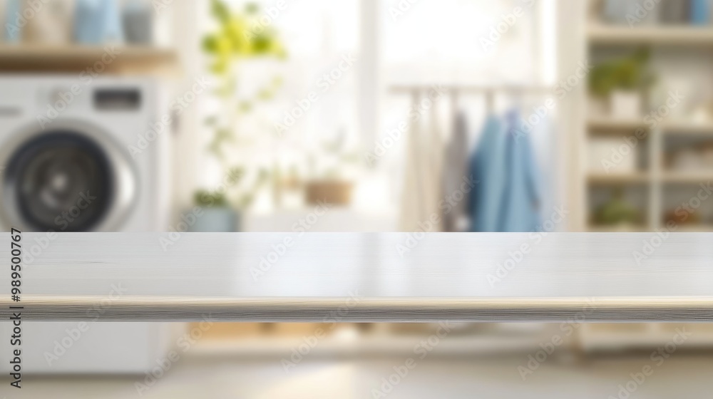 White empty table against a blurred backdrop of laundry White empty table against a blurred backdrop of laundry