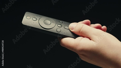 Wallpaper Mural Adding silver batteries AA and AAA in remote controller TV close-up. Batteries are common in portable electronic devices. An AA battery is composed of a single electrochemical cell that may be either Torontodigital.ca