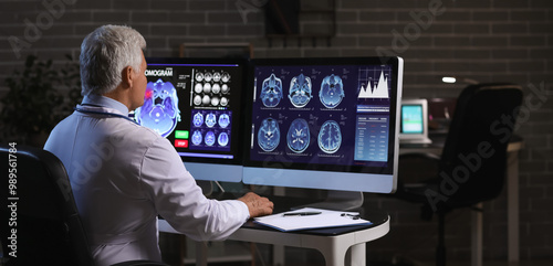 Senior neurologist with MRI...