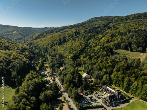 Beskid Maly aerial panorama of potrojna hill and czarny gron.Little Beskids mountain range in summer.Aerial drone view of Rzyki Village in Beskid Maly Poland.Czarny gron ski resort in Rzyki. photo