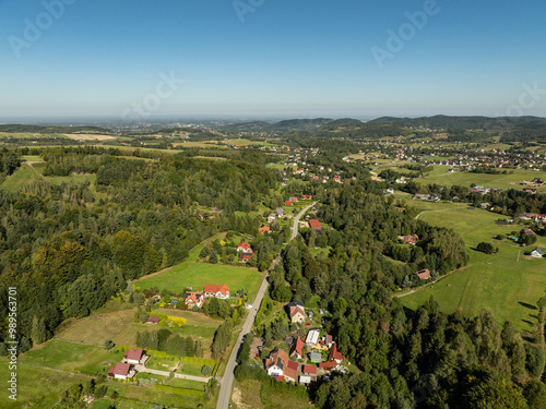 Beskid Maly aerial panorama of potrojna hill and czarny gron.Little Beskids mountain range in summer.Aerial drone view of Rzyki Village in Beskid Maly Poland.Czarny gron ski resort in Rzyki. photo