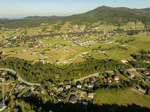 Beskid Maly aerial panorama of potrojna hill and czarny gron.Little Beskids mountain range in summer.Aerial drone view of Rzyki Village in Beskid Maly Poland.Czarny gron ski resort in Rzyki. photo