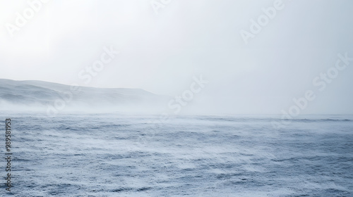 Obraz na płótnie A snowstorm sweeping across a barren plain with visibility reduced to a few feet as the snow swirls violently in the wind. w salonie